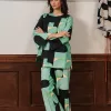 "Bold women's two-piece outfit featuring a green fluorescent viscose top with artistic multicolor print and matching wide-leg pants – statement coord set"