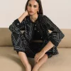 "Women's jet black two-piece outfit with white geometric print, featuring a button-down ban neck top and straight-fit long pants – modern coord set"