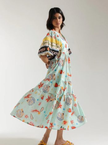 Front view of pale green floral print dress with gathered waist