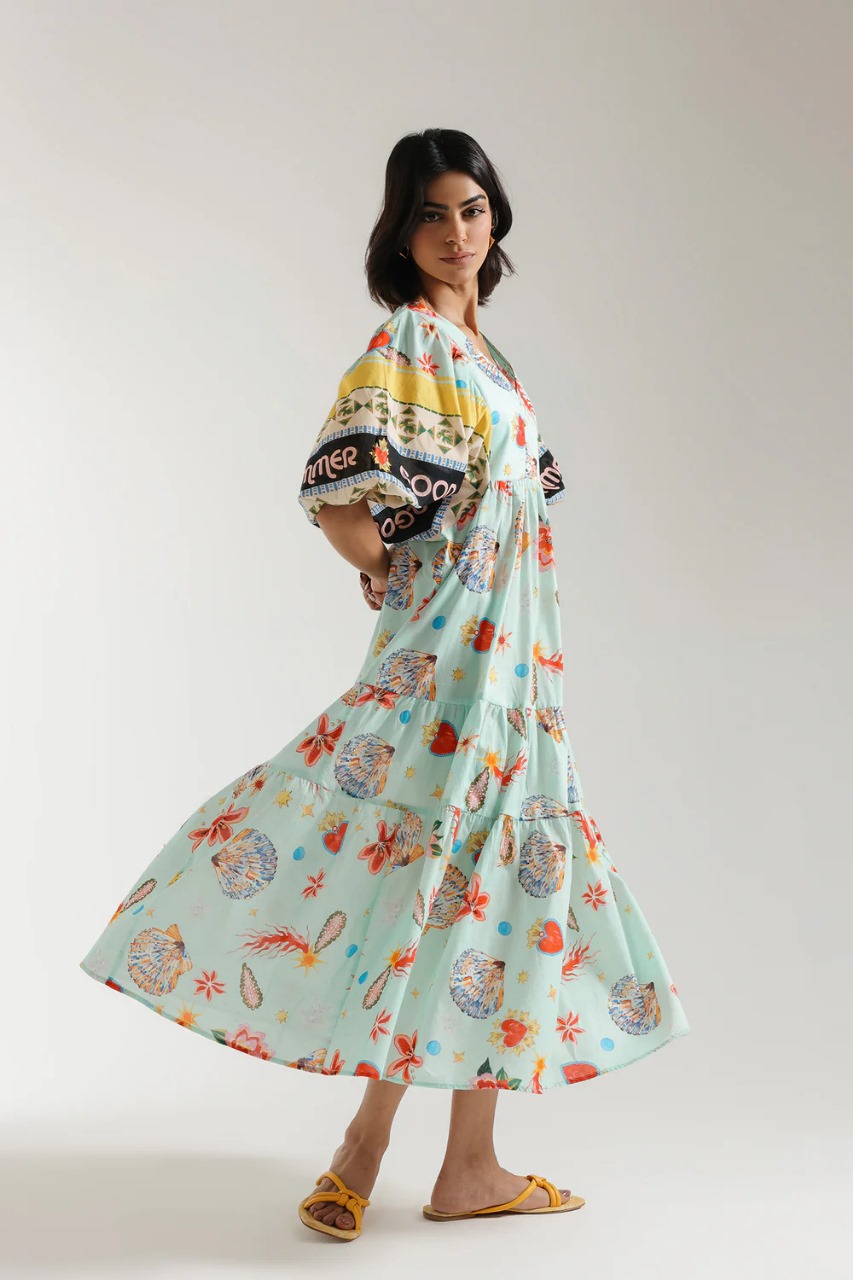 Front view of pale green floral print dress with gathered waist