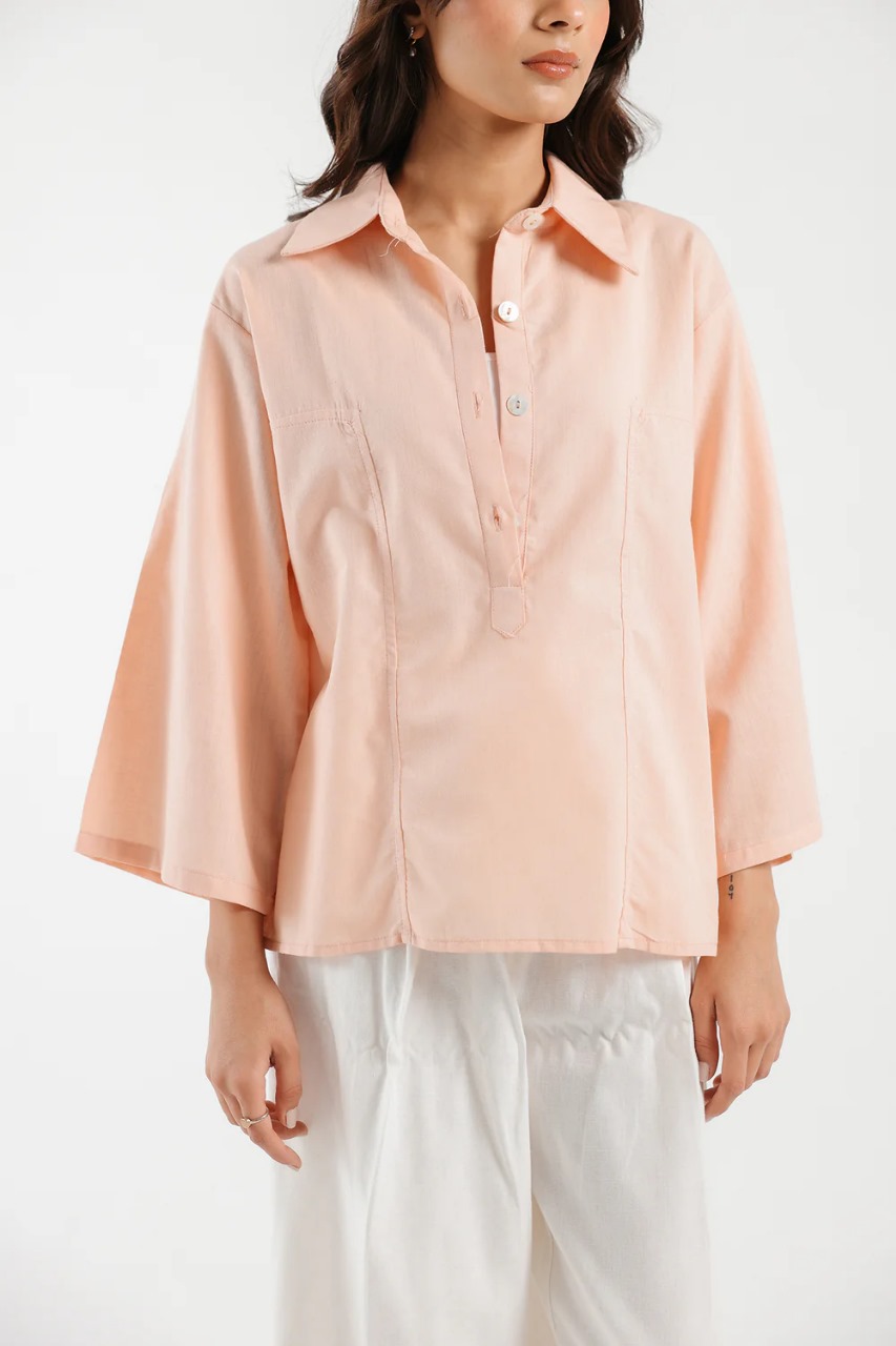 Casual summer shirt in soft orange hue for women
