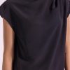 Model in sleeveless pleated top – jet black color
