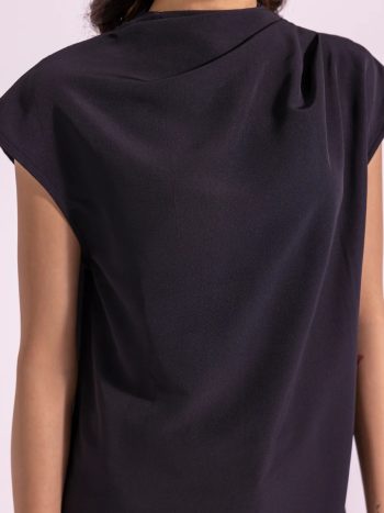 Model in sleeveless pleated top – jet black color